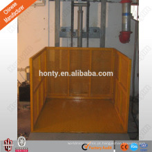 A carga hidráulica resistente do trilho de guia levanta para o elevador de armazém